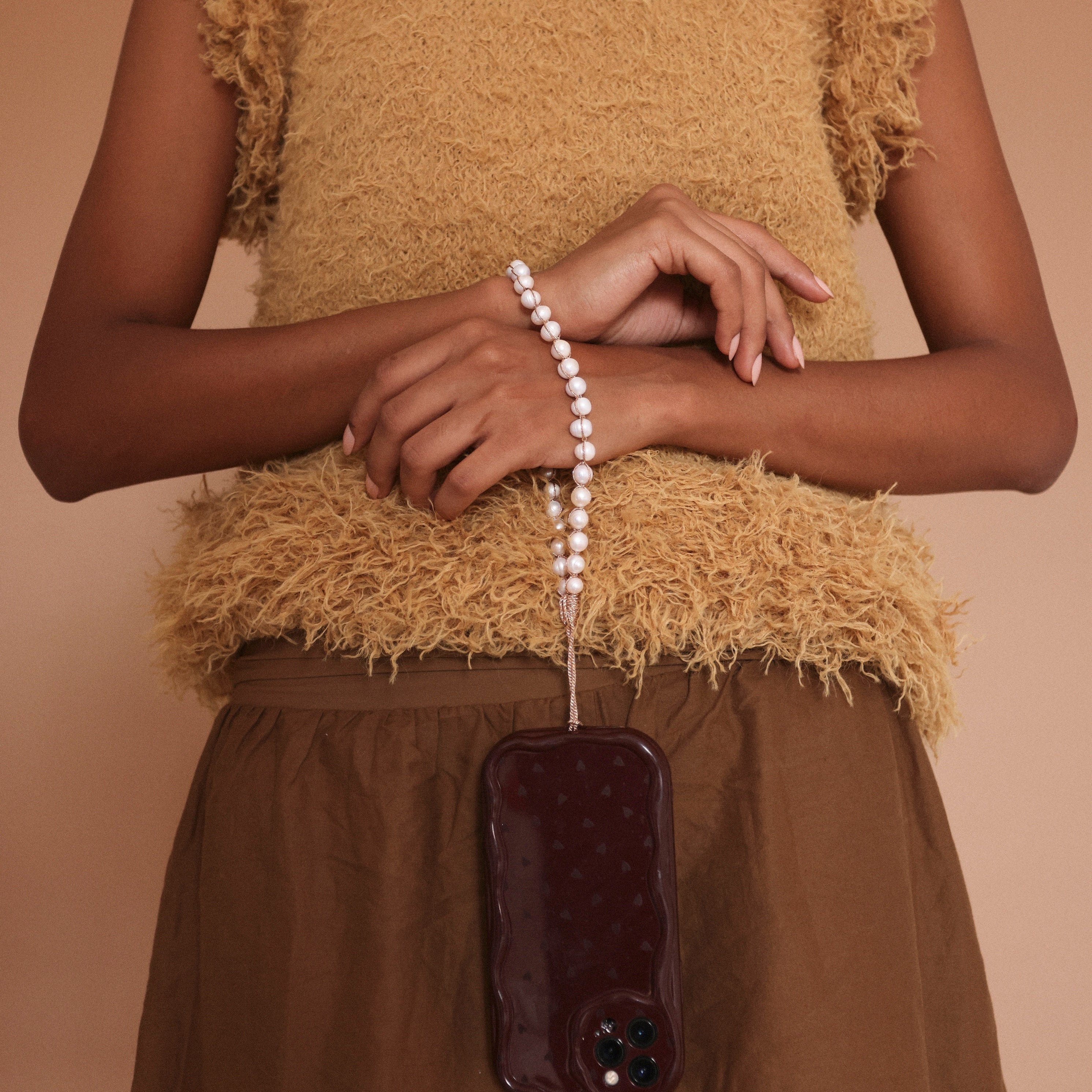 Anar Wrist Phone Strap in Peach Truffle Parma